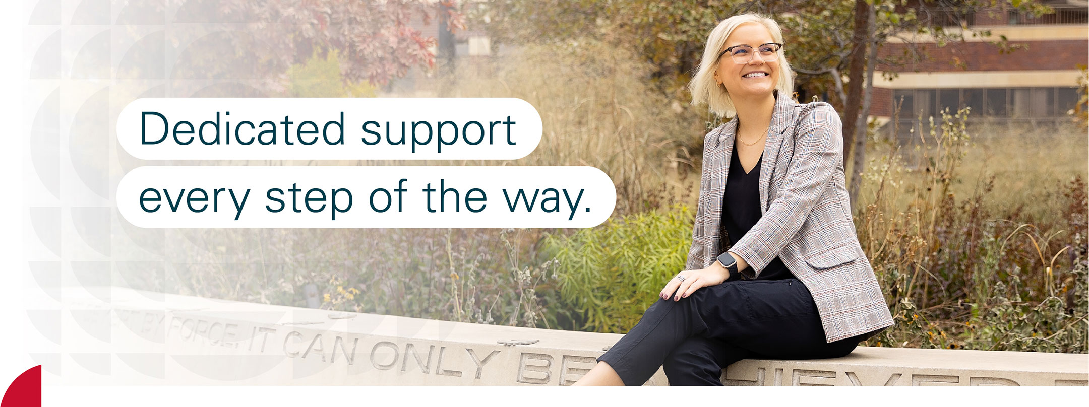 student sitting with the text dedicated support every step of the way.